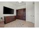 Office/den features custom built-ins and granite countertops at 12219 Crystal Shore Ave, Las Vegas, NV 89138