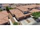 A nice aerial view showing a two-story house with a two car garage and nice landscaping and many other homes at 1435 Orange Jubilee Rd, Henderson, NV 89014
