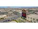 Aerial view of Sunset Station Hotel & Casino surrounded by shopping centers and scenic mountains in the background at 1435 Orange Jubilee Rd, Henderson, NV 89014