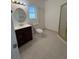 Bathroom features a toilet, vanity, and glass enclosed shower at 1830 Justine Ct, Pahrump, NV 89048