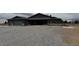 Charming single-story home with gravel front yard and attached two-car garage at 1830 Justine Ct, Pahrump, NV 89048