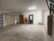 Three car garage featuring two garage doors at 1830 Justine Ct, Pahrump, NV 89048