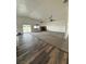 Spacious living room with carpet, a fireplace, and access to the backyard at 1830 Justine Ct, Pahrump, NV 89048