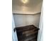 Empty walk-in closet features wood-look floors and shelving at 1830 Justine Ct, Pahrump, NV 89048