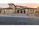 Stunning two-story home with a tile roof, manicured landscaping, and a three-car garage at 19 Rue Grimaldi Way, Henderson, NV 89011
