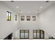 Dramatic view of a foyer with many windows and high ceilings at 19 Rue Grimaldi Way, Henderson, NV 89011