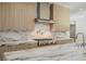 Gourmet kitchen showcasing marble countertops, stainless steel appliances, and modern cabinets at 19 Rue Grimaldi Way, Henderson, NV 89011