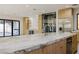 Expansive kitchen with a marble island, stainless appliances, and an open layout at 19 Rue Grimaldi Way, Henderson, NV 89011