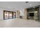 Beautiful wet bar with beverage refrigerator and glass-enclosed wine storage at 19 Rue Grimaldi Way, Henderson, NV 89011