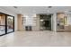 Wet bar area boasts granite countertops, beverage refrigerator and wine storage at 19 Rue Grimaldi Way, Henderson, NV 89011