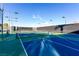 Well-maintained outdoor tennis and pickleball courts with lighting for evening games at 19 Rue Grimaldi Way, Henderson, NV 89011