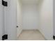 An empty, walk-in closet with ample storage space and neutral finishes at 19 Rue Grimaldi Way, Henderson, NV 89011