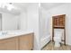 Bright bathroom featuring ample counter space and a shower-tub combo at 1900 Mountain Hills Ct # 203, Las Vegas, NV 89128