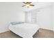Well-lit bedroom with neutral carpet and paint, ceiling fan, and window at 1900 Mountain Hills Ct # 203, Las Vegas, NV 89128
