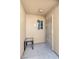 Exterior entryway features a security gate and small window, providing a secure welcome to the residence at 1900 Mountain Hills Ct # 203, Las Vegas, NV 89128