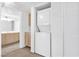 Conveniently located laundry area inside the unit features a stackable washer and dryer at 1900 Mountain Hills Ct # 203, Las Vegas, NV 89128