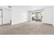 Bright living room with sliding glass doors leading to a balcony, enhancing the living space at 1900 Mountain Hills Ct # 203, Las Vegas, NV 89128
