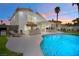 Charming backyard with a refreshing pool, outdoor kitchen, and covered patio, perfect for enjoying outdoor living and entertaining at 222 Hollyfern St, Henderson, NV 89074