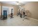 Exercise room with workout equipment, ceiling fan, and bright window at 222 Hollyfern St, Henderson, NV 89074
