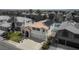 Aerial shot of home with solar panels, an in-ground pool, desert landscaping, and a two-car garage at 222 Hollyfern St, Henderson, NV 89074
