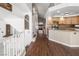 Open floor plan featuring a kitchen island with granite countertops, tile backsplash, and a breakfast bar at 222 Hollyfern St, Henderson, NV 89074
