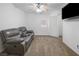 Relaxing space with comfortable seating and a mounted television at 222 Hollyfern St, Henderson, NV 89074