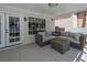 Inviting covered patio with outdoor seating, perfect for relaxing or entertaining at 222 Hollyfern St, Henderson, NV 89074