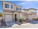 Lovely two-story house boasting a charming front entrance with a well-kept lawn and a paved driveway at 2272 Platinum Band St, Las Vegas, NV 89156