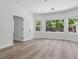 Sunlit bedroom with large windows and neutral wall paint at 2579 Ivoryhill St, Las Vegas, NV 89135