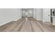 Open floor plan living room with hardwood floors and neutral wall paint at 2579 Ivoryhill St, Las Vegas, NV 89135