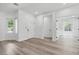Spacious living room with bright light from exterior windows and hardwood floor at 2579 Ivoryhill St, Las Vegas, NV 89135