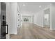 Bright, open living space with hardwood floors and fresh, neutral paint, perfect for modern living at 2579 Ivoryhill St, Las Vegas, NV 89135