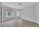 Bright, airy bedroom features wood-look floors and neutral paint at 2589 Sun Reef Rd, Las Vegas, NV 89128