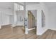 Elegant entryway featuring modern design, wood floors, and glass wall at 2589 Sun Reef Rd, Las Vegas, NV 89128