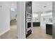 Well-equipped kitchen with dark wood cabinets and modern stainless steel appliances at 2589 Sun Reef Rd, Las Vegas, NV 89128