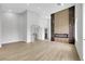 Open floorplan living room features fireplace and wood floors at 2589 Sun Reef Rd, Las Vegas, NV 89128