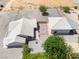 A birds-eye view of the house with detached garage revealing its roof, surroundings, and overall property layout at 2650 Sagebrush Ave, Pahrump, NV 89048