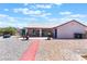 Expansive backyard features a patio, gravel cover, and well-maintained landscaping, ideal for outdoor activities at 2650 Sagebrush Ave, Pahrump, NV 89048