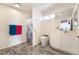 Well-lit bathroom with a modern toilet, sleek vanity, and contemporary fixtures at 2650 Sagebrush Ave, Pahrump, NV 89048