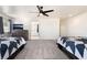 Spacious bedroom features coordinated furnishings and decor, along with plenty of natural light creating a warm and inviting atmosphere at 2650 Sagebrush Ave, Pahrump, NV 89048