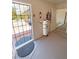 Inviting entryway features a security door, carpet flooring, and adjacent closet at 2650 Sagebrush Ave, Pahrump, NV 89048