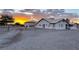 House exterior with a gravel yard and fenced in entrance at 2650 Sagebrush Ave, Pahrump, NV 89048
