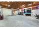 Expansive garage interior boasting high ceilings, versatile storage options, and potential for various uses at 2650 Sagebrush Ave, Pahrump, NV 89048