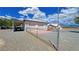 Detached garage with covered area and ample parking, perfect for car enthusiasts or hobbies at 2650 Sagebrush Ave, Pahrump, NV 89048