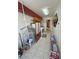 Functional laundry room with modern appliances, water softener system, and exterior access at 2650 Sagebrush Ave, Pahrump, NV 89048