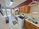 Bright laundry room with modern appliances and storage cabinets at 2650 Sagebrush Ave, Pahrump, NV 89048