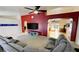 Living room showcasing a mounted TV and fireplace at 2650 Sagebrush Ave, Pahrump, NV 89048