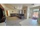 Cozy living room showcasing a large sectional and colorful glass window features at 2650 Sagebrush Ave, Pahrump, NV 89048
