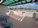 Outdoor patio with mountain views and shaded seating at 2650 Sagebrush Ave, Pahrump, NV 89048