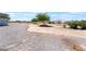 Expansive yard featuring drought tolerant landscaping with mature trees, providing shade and privacy at 2650 Sagebrush Ave, Pahrump, NV 89048